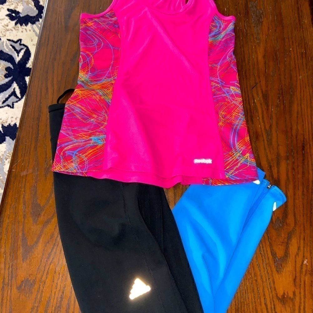 Woman’s Reebok and adidas workout outfit